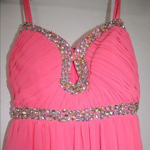 Neon pink formal dress with gem detailing